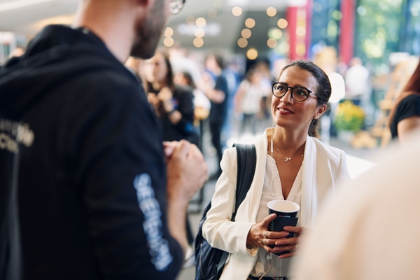 Collage image showing people at a previous code.talks event